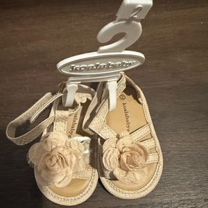 Brand new baby girls sandals in beige size 2 $15
